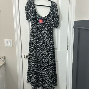 Dressed in LaLa smiley face dress